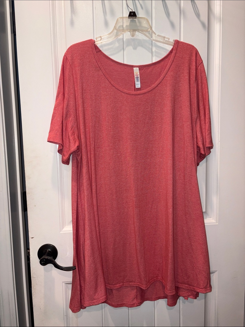 a LuLaRoe Perfect Tee Tunic in a heathered coral 3xl